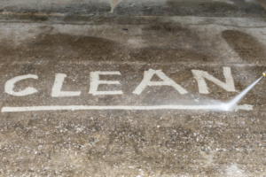 Power washing concrete, words: clean.